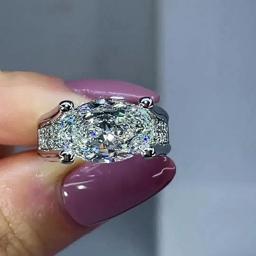4.5ct Distinctive Inverted Tension-set Oval Cut Sterling Silver Moissanite Engagement Ring