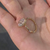 Oval Cut Hidden Halo Engagement Ring