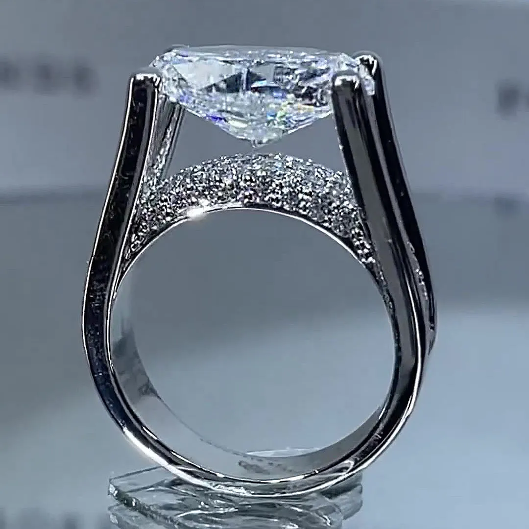 4.5ct Distinctive Inverted Tension-set Oval Cut Sterling Silver Moissanite Engagement Ring