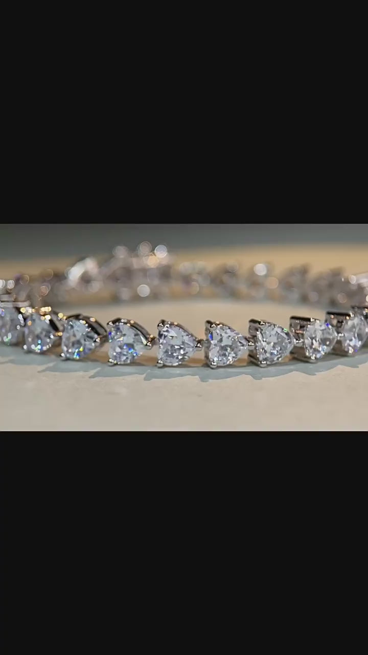 Beautiful Heart Cut Tennis Bracelet in Sterling Silver
