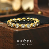 Classic Round Cut Eternity Golden Tone Band
