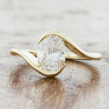 Oval Cut Bypass Solitaire Engagement Ring in Sterling Silver