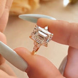 Daity Emerald Cut Three Stone Sterling Silver Bridal Set