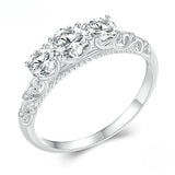 Stunning Three Stone Moissanite Sterling Silver Band